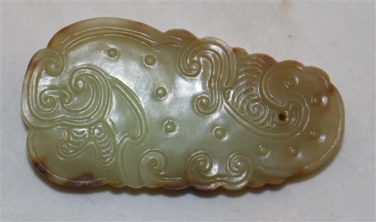 A Chinese archaistic yellow and russet jade pendant plaque, 5.2cm